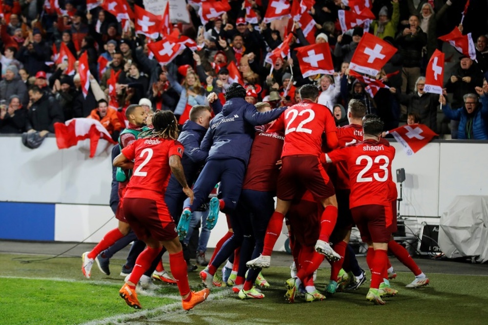 Swiss pip Italy for World Cup ticket as Kane fires England to Qatar