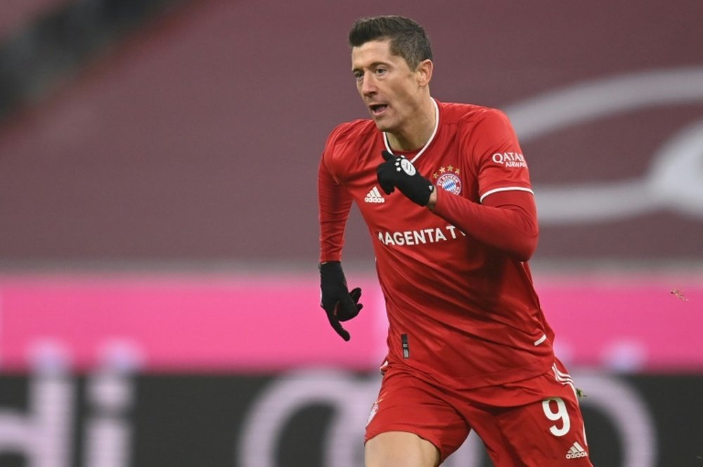 Lewandowski nets 250th Bundesliga goal as Bayern keep pace with Leverkusen. AFP