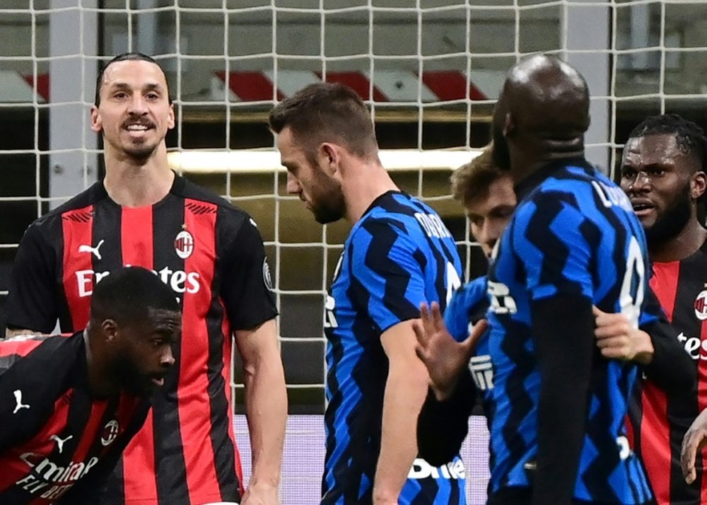 Zlatan Ibrahimovic (L) argues with Romelu Lukaku (R) during their Italian Cup clash. AFP