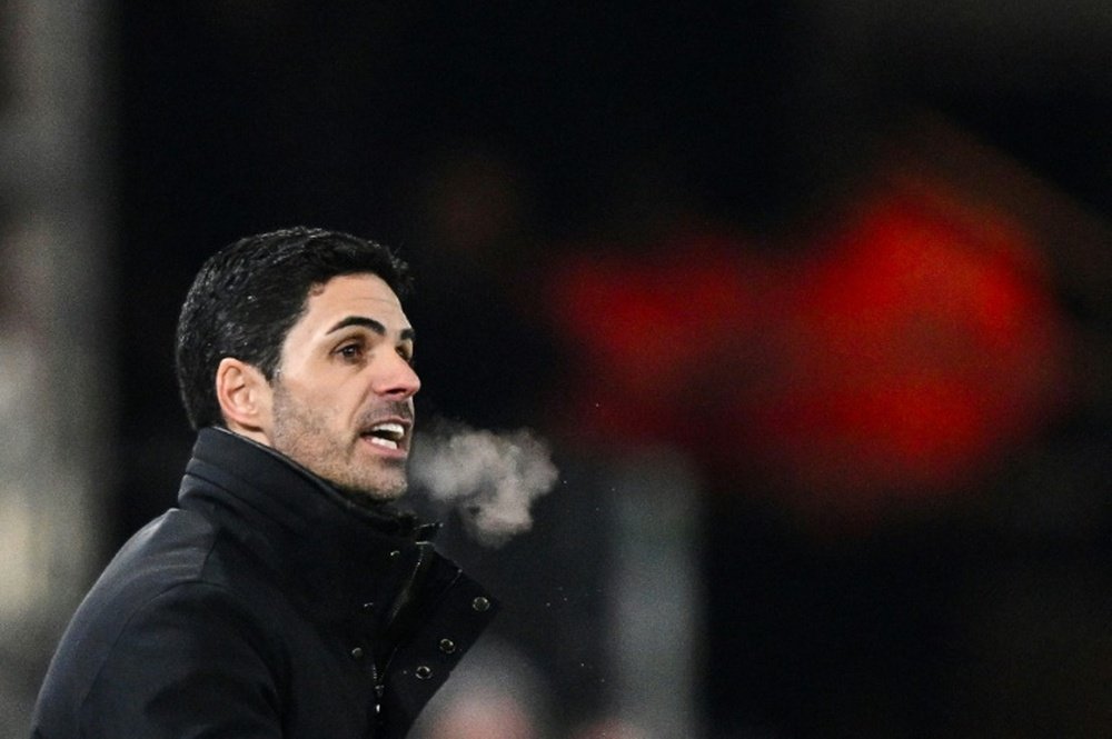 Arteta will not be in the dugout at Villa Park. AFP