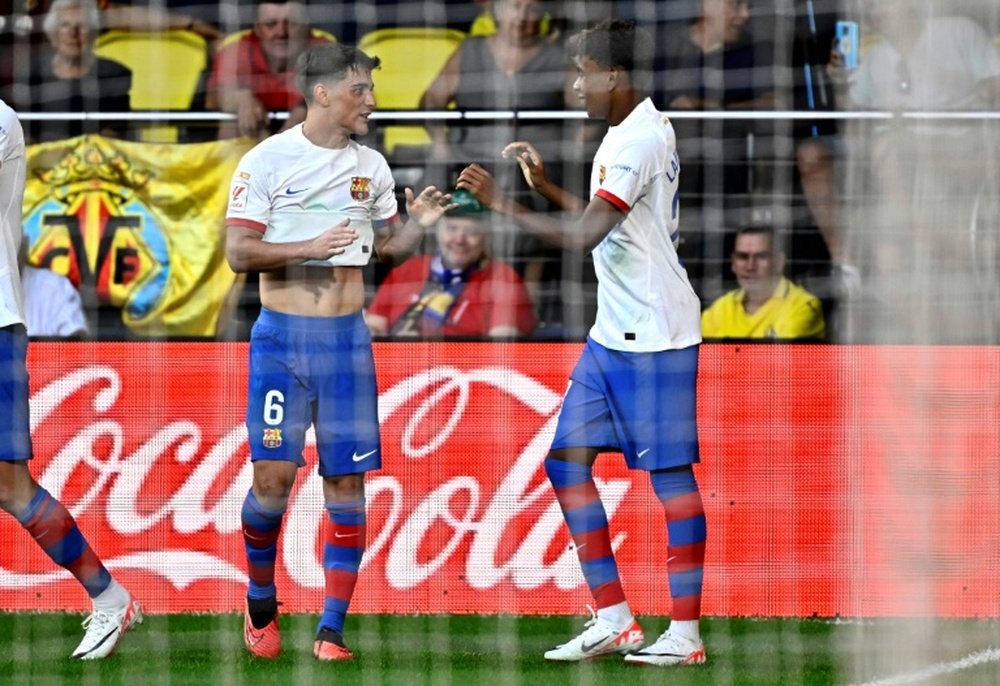 Lamine Yamal (R) shone brightly against Villarreal. AFP