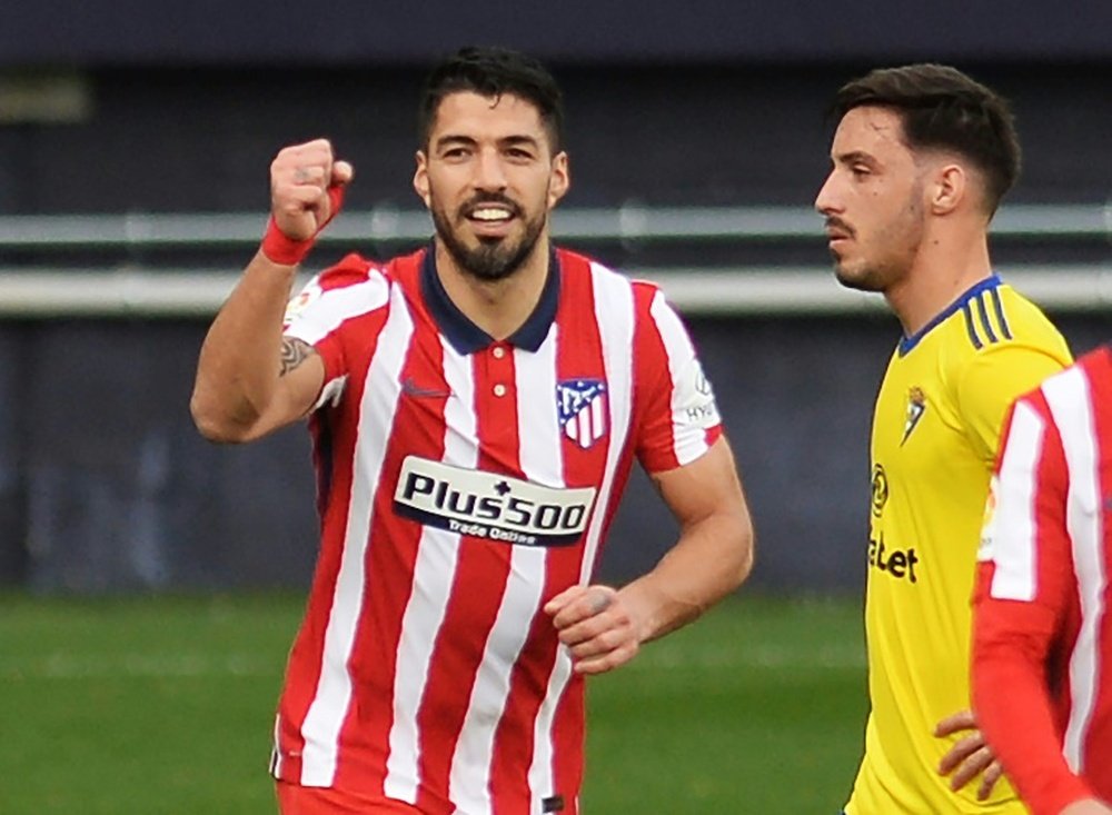 Suarez double at Cadiz sends Atletico 10 points clear. AFP