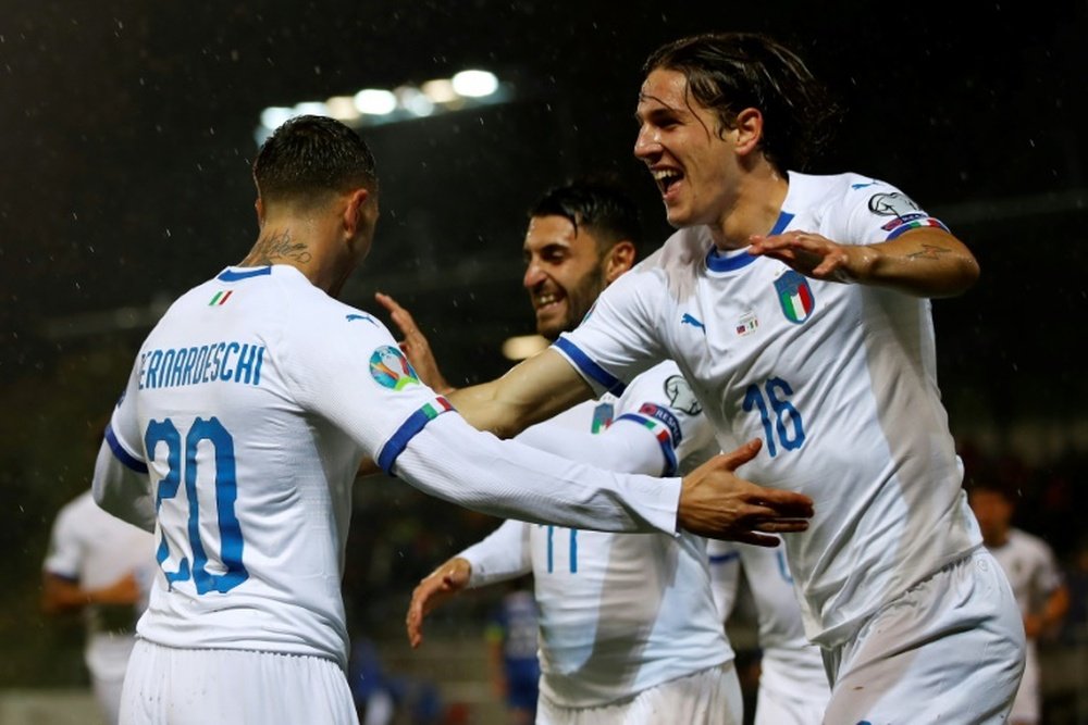 Bernardeschi (L) opened the scoring for Italy in rout of Liechtenstein. AFP
