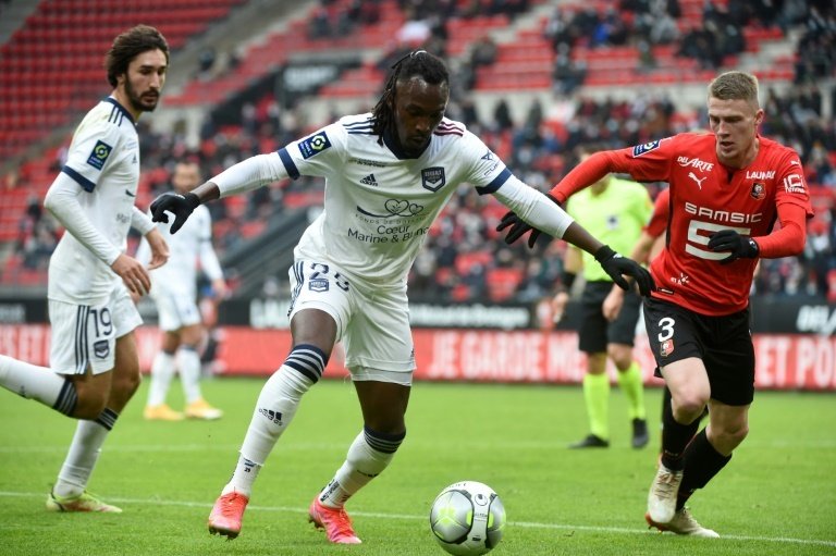 Honduras striker Alberth Elis remained in hospital on Sunday, according to media reports, after being put into a coma following a serious head injury during Bordeaux's Ligue 2 match against Guingamp.