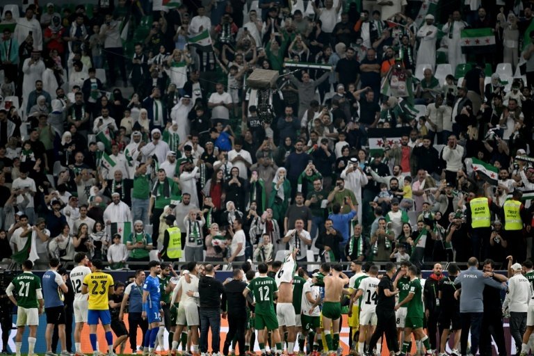 Celebrations erupted on the pitch and in the stands in Doha on Sunday when both Palestine and Syria made it through to the Arab Cup quarter-finals following a 0-0 draw.
