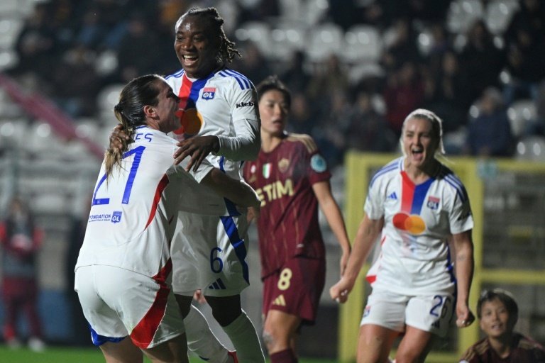 Lyon beat Roma 3-0 to maintain their 100 percent record in Group A of the Women's Champions League on Wednesday, while Wolfsburg thrashed Galatasaray to pick up their first points.