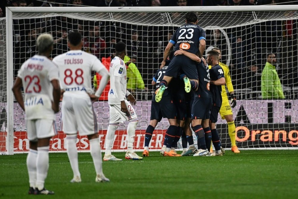 Marseille reclaim second after late Lyon own goal. AFP
