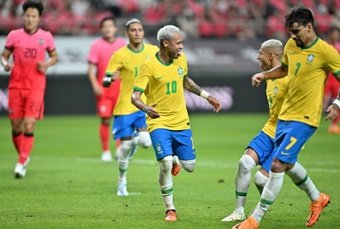 Brazil forward Neymar celebrates one of his two penalties against South Korea. AFP