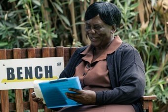 Sitting next to a patient with depression on a garden bench in Zimbabwe's capital Harare, 70-year-old Shery Ziwakayi speaks gently, offering accessible therapy with a warm and reassuring smile.