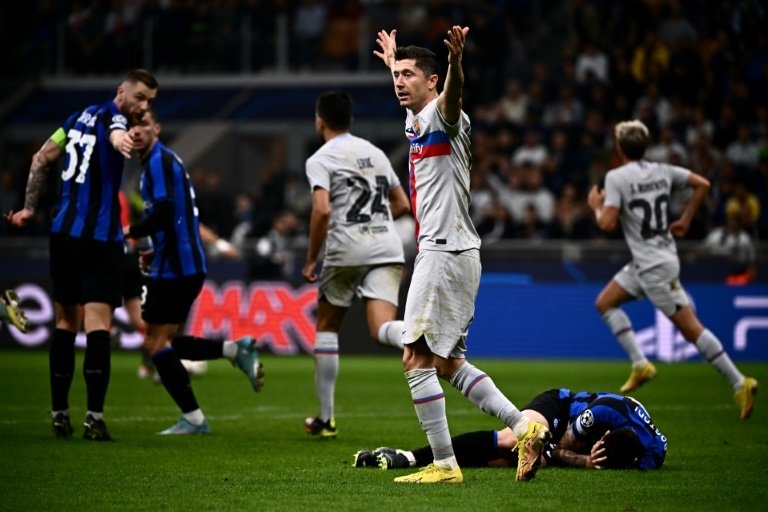Barcelona sit in third place three points behind Inter. AFP