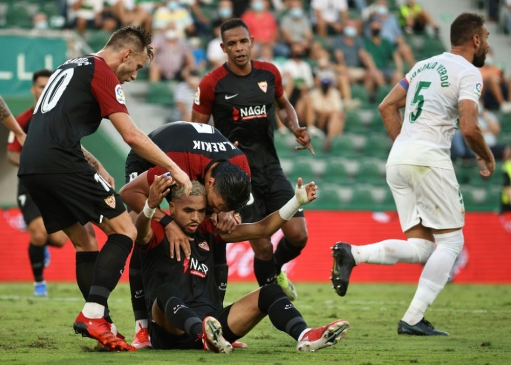 Youssef En-Nesyri (bottom) scored as Sevilla drew at Elche. AFP