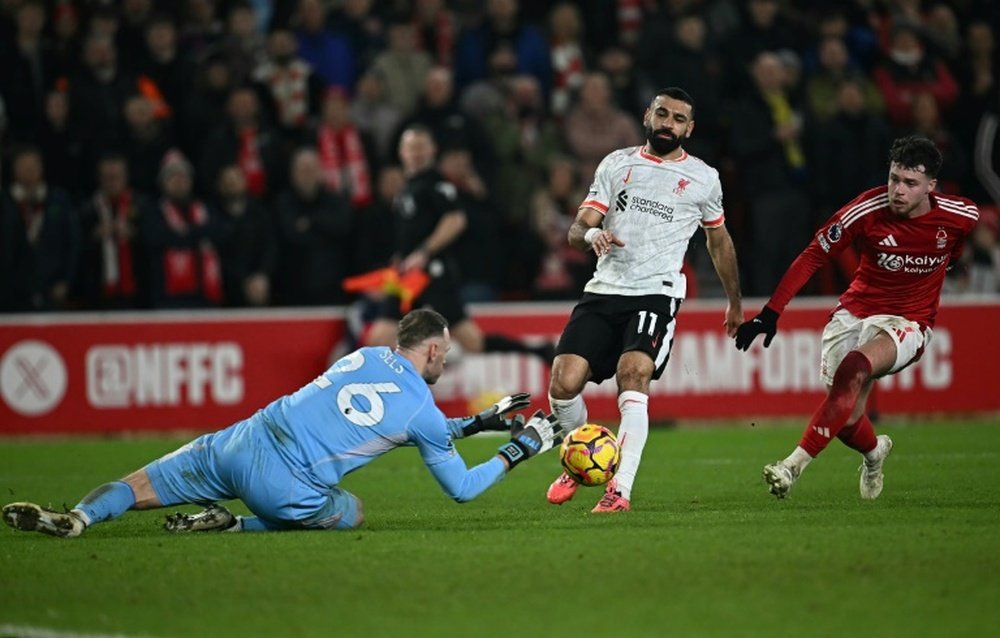 Arsenal can close the gap on the Reds to four points with a win against Spurs. AFP