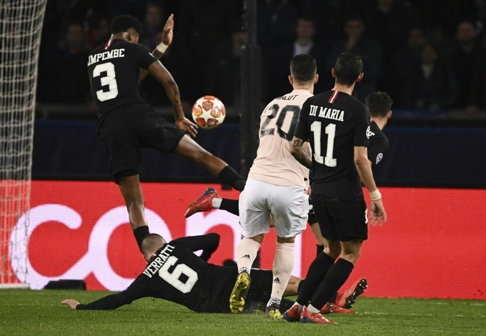 Kimpembe was penalised for this handball. AFP