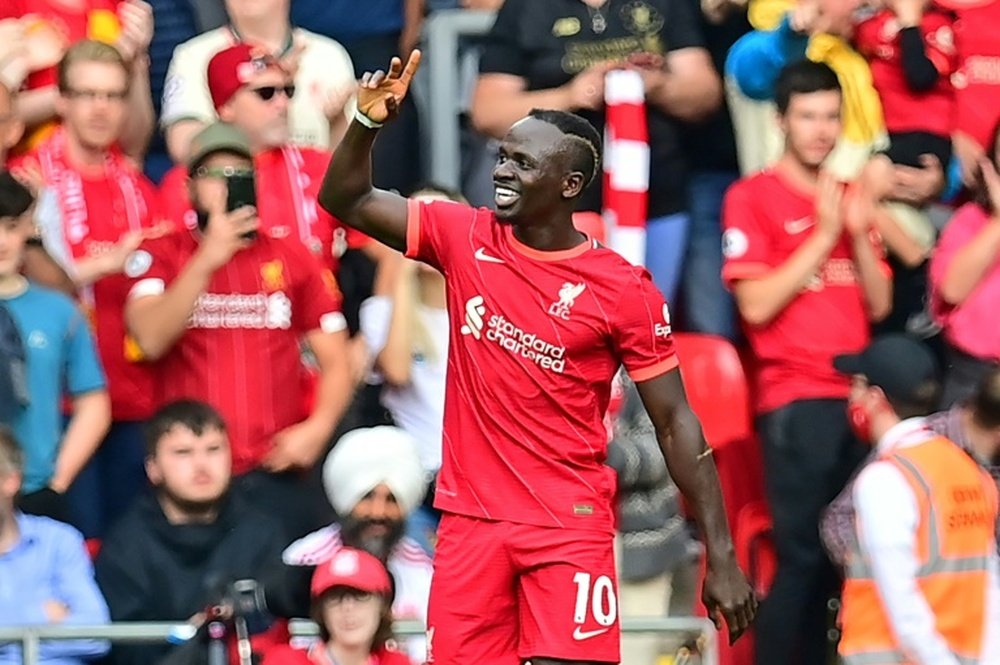 Mane reaches century as Liverpool top Premier League, Arsenal ease Arteta pressure. AFP