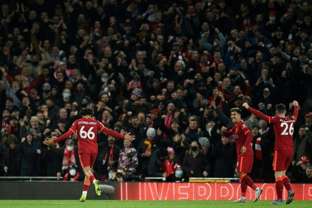 Trent Alexander-Arnold (L) sealed victory for Liverpool over Newcastle. AFP