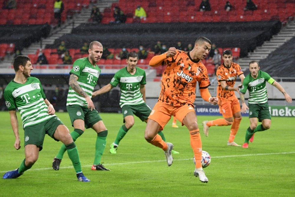 Cristiano Ronaldo set up Morata as Juve won 1-4 at Ferencvaros. AFP