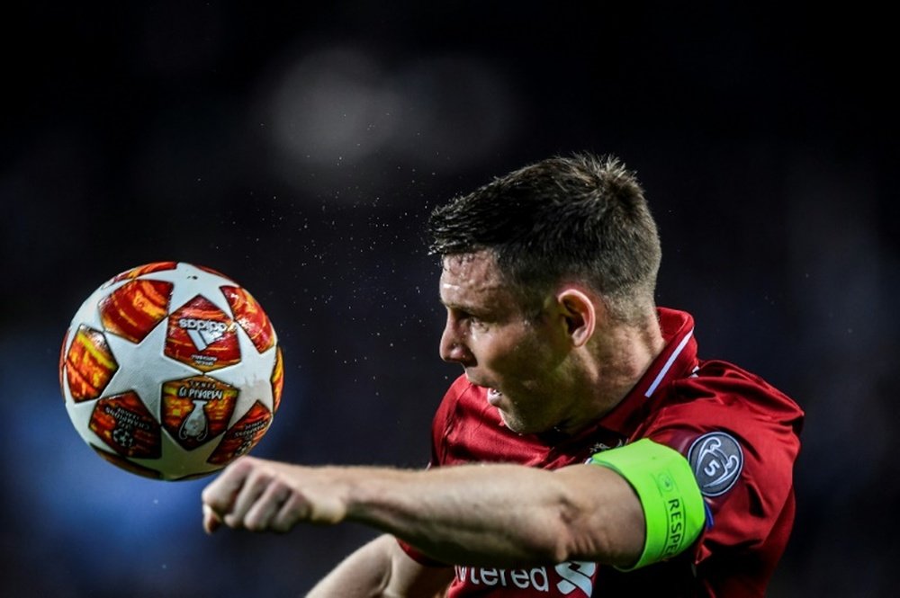 James Milner in Champions League action for Liverpool. AFP