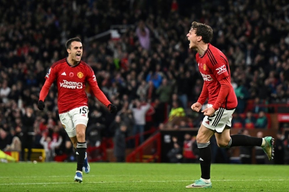 Victory takes United within six points of league leaders Manchester City. AFP