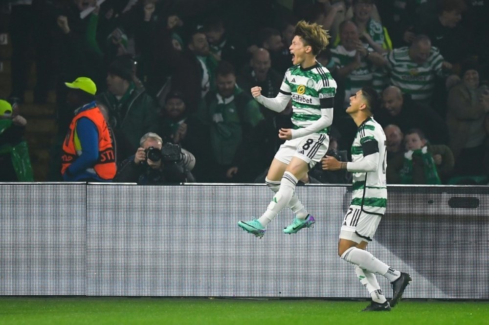 Kyogo Furuhashi (L) scored the decisive goal in Celtic's 2-1 win over Rangers. AFP