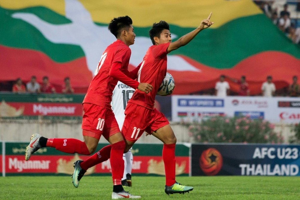Myanmar player in Malaysia punished over anti-coup salute. AFP