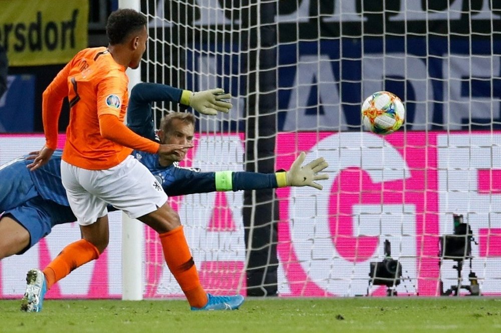 Germany slip up to the Netherlands, Croatia thrash Slovakia. AFP