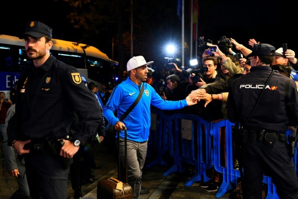 Carlos Tevez arrived in Madrid with the rest of his Boca Juniors team-mates on Wednesday. AFP