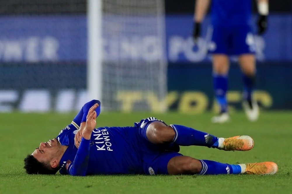 James Justin had to go off injured in Leicester's win over Brighton. AFP