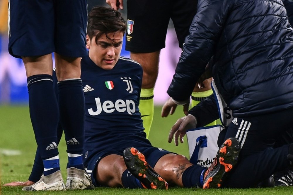 Paulo Dybala had to go off injured for Juventus against Sassuolo. AFP