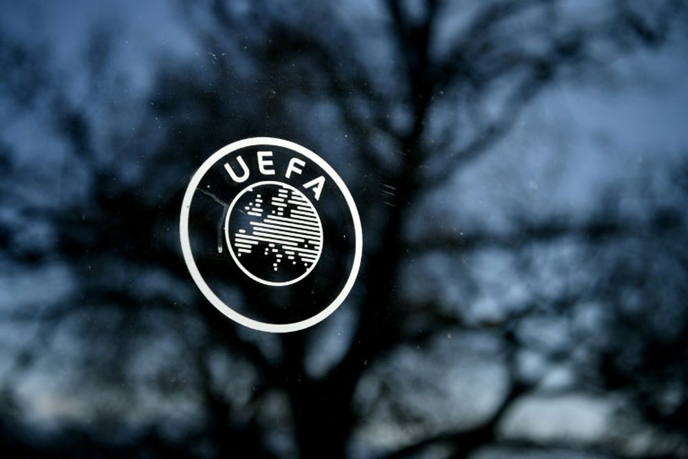 UEFA open to seasons ending early, UCL should be 'on sporting merit'. AFP