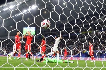 An unconvincing Iran toiled to a 1-0 win over Hong Kong on Friday to progress to the knockout rounds of the Asian Cup in a game of spurned chances for both teams.