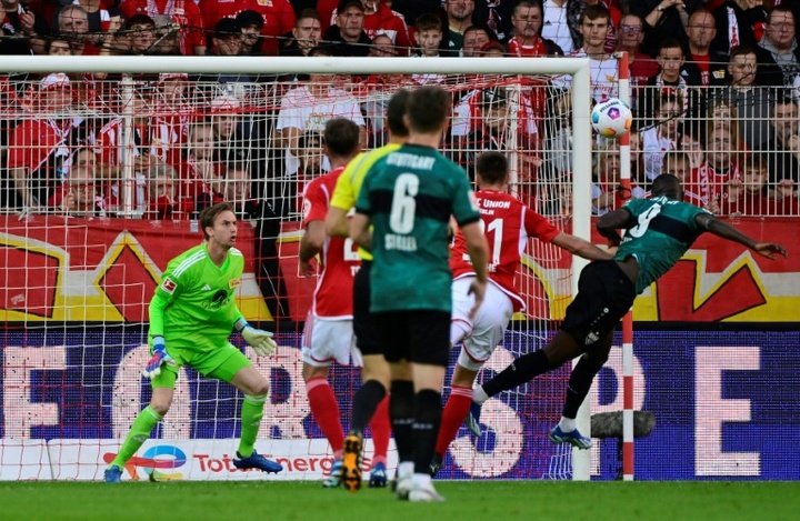 Grimaldo returns Leverkusen to top with narrow win at Wolfsburg