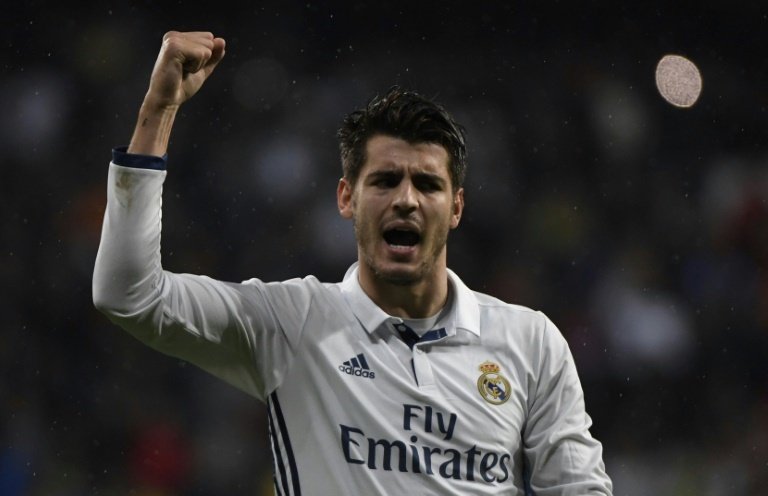 Morata has signed for Chelsea in a club-record move. AFP