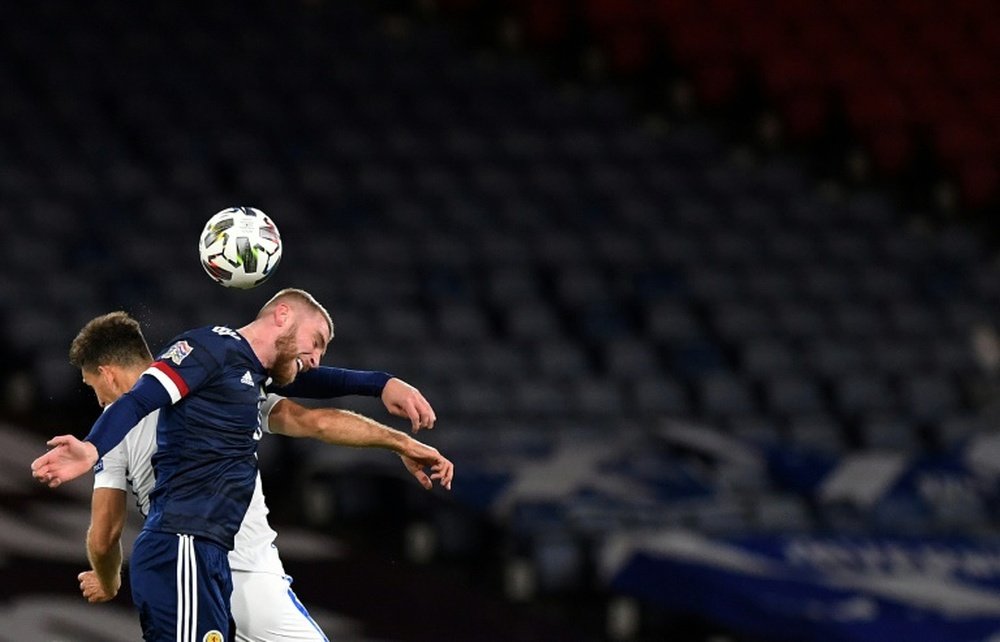 Scotlands Oli McBurnie (R) is still waiting to score his first international goal. AFP