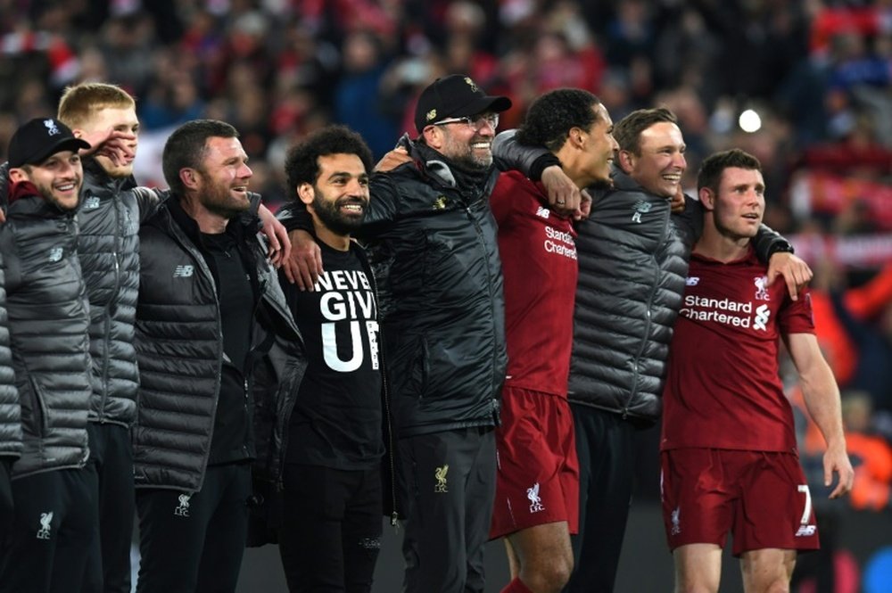 Liverpool celebrate their incredible victory over Barcelona last night. AFP