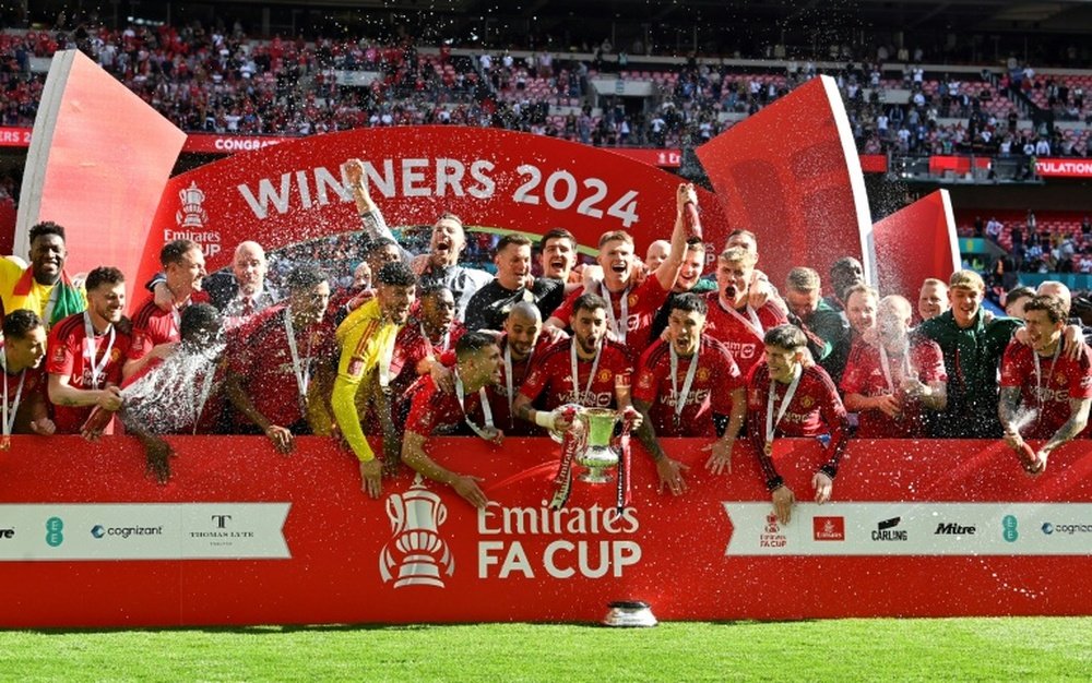 Manchester United saved their season last year by winning the FA Cup. AFP