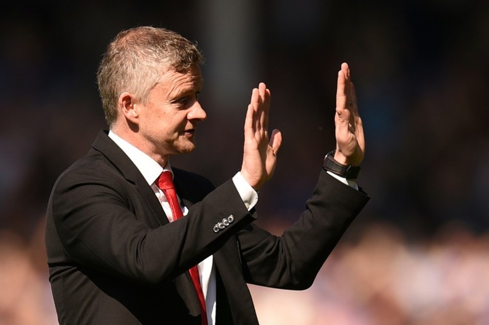 Hands up: Solskjaer's Manchester United were thrashed 4-0 by Everton. AFP