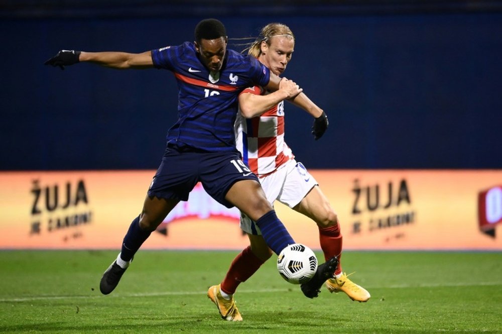 Croatia's Vida informed of Covid-19 positive at half-time of friendly. AFP