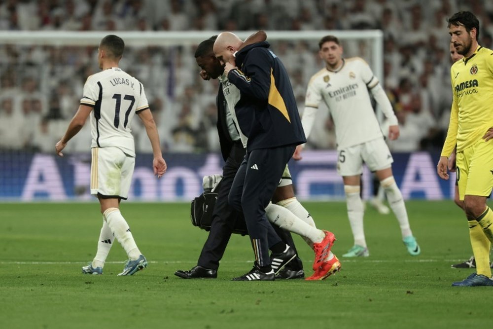Alaba was helped to leave the pitch after suffering a cruciate ligament injury. AFP