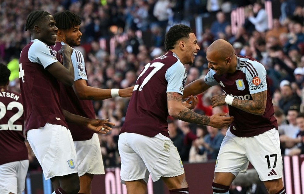 Donyell Malen (R) and Morgan Rogers (C) scored for Aston Villa. AFP