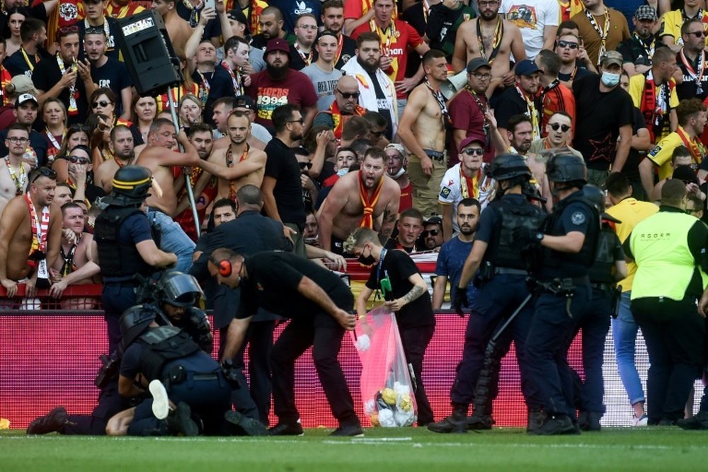 French football wrestles with violence in stadiums as fans return. AFP