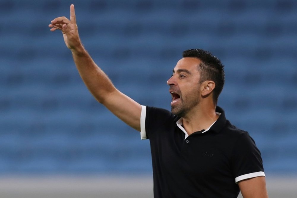 Xavi's Al Sadd hold Duhail, Gomis hits hat-trick for Hilal.