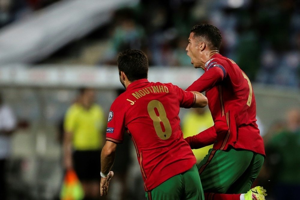 Cristiano Ronaldo scored a dramatic late double to take his tally to 111 international goals. AFP