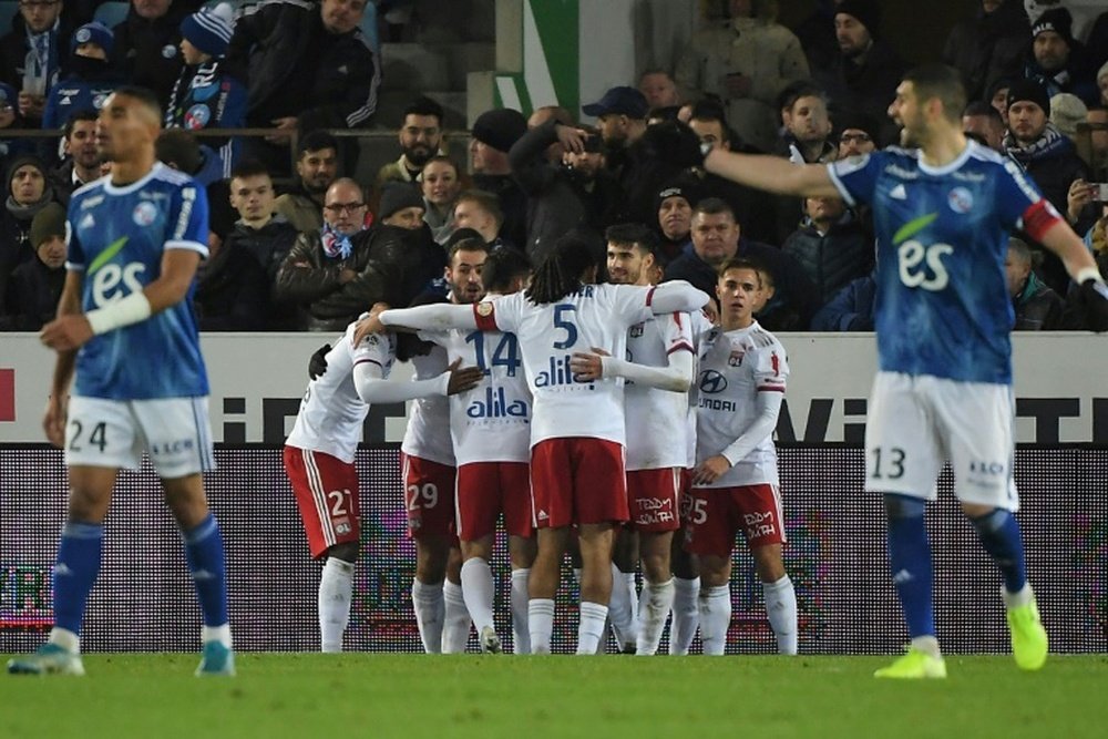 Lyon are just two points off third after coming from behind to defeat Strasbourg. AFP