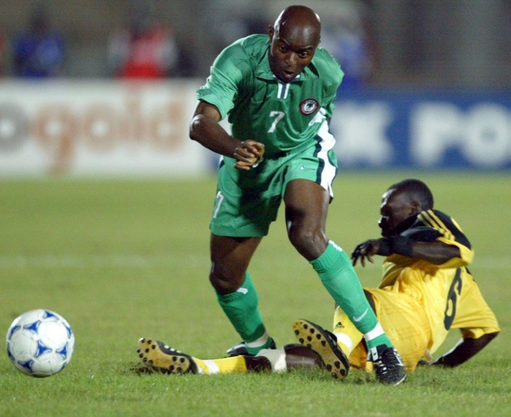 Finidi George playing for Nigeria against Ghana during the 2002 Africa Cup of Nations in Mali. AFP