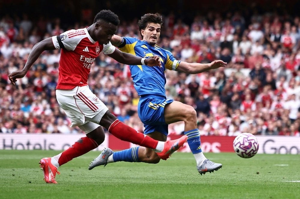 Arsenal's Bukayo Saka (L) will be sidelined for a couple of weeks. AFP