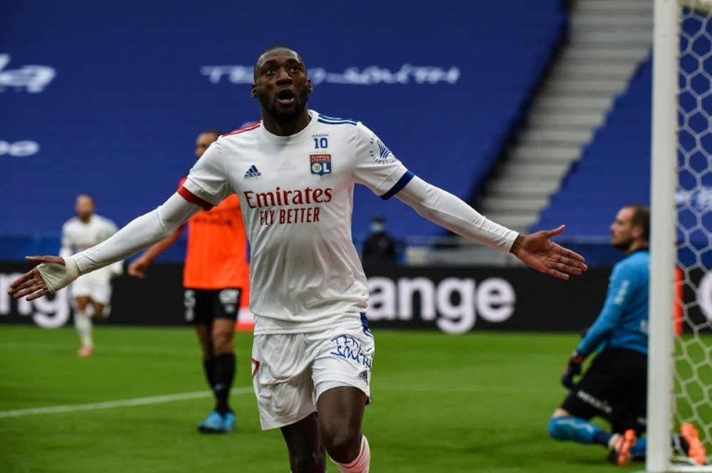 Karl Toko Ekambi scored in Lyon's 3-0 win versus Reims. AFP