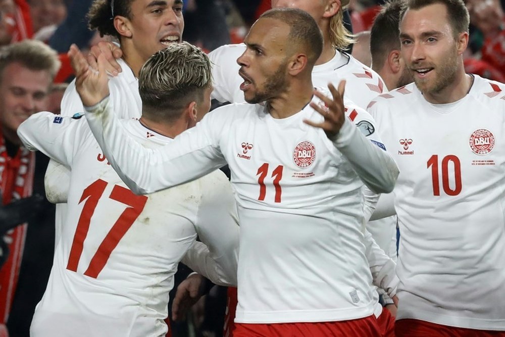 Danes, Swiss through to Euro 2020 as rampant Italy hit nine. AFP