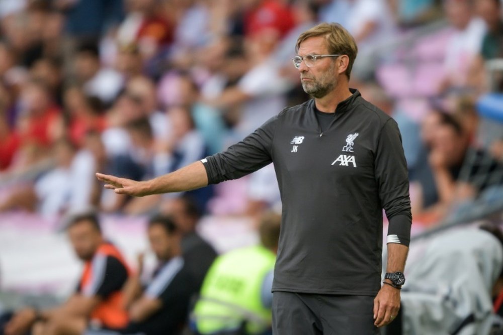 Klopp warns Liverpool to deal with Champions League scrutiny. AFP