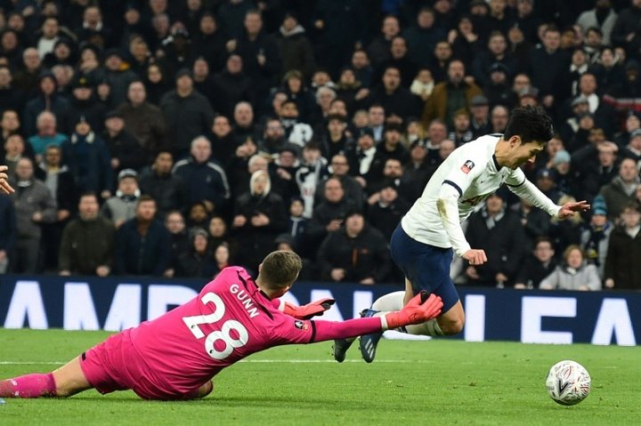 Son late show sends Spurs into FA Cup fifth round