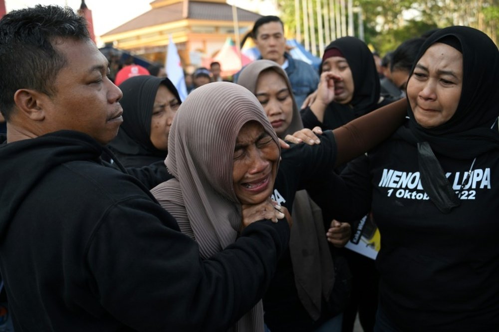 135 people lost their lives at the Kanjuruhan stadium one year ago. AFP